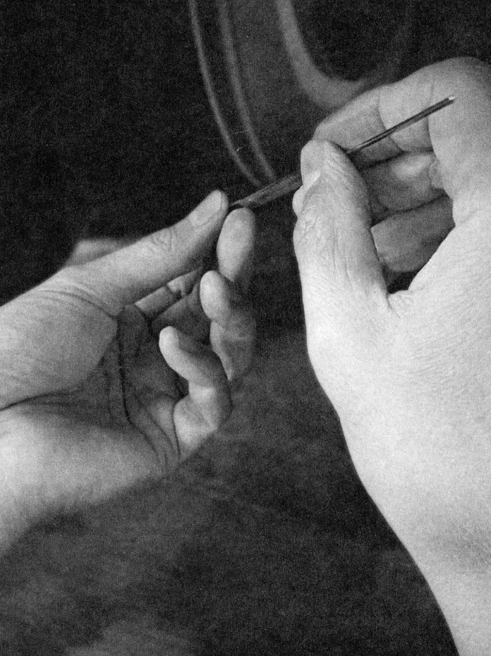 Hands crafting glasses